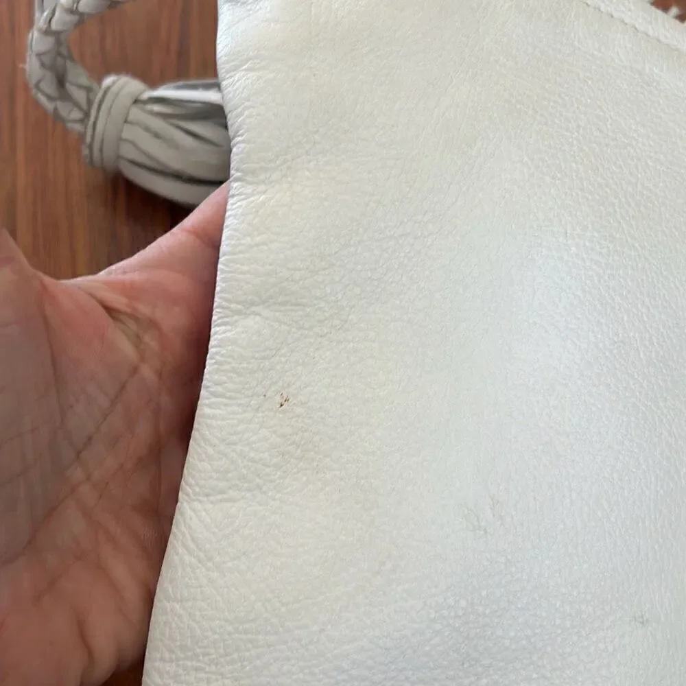 Jennifer Haley white leather clutch handbag with large tassel